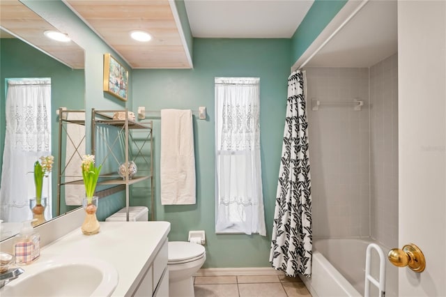 full bathroom featuring baseboards, toilet, tile patterned flooring, shower / bathtub combination with curtain, and vanity