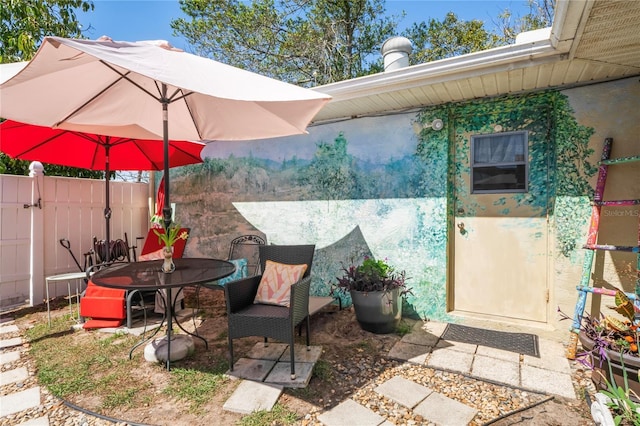 view of patio with fence