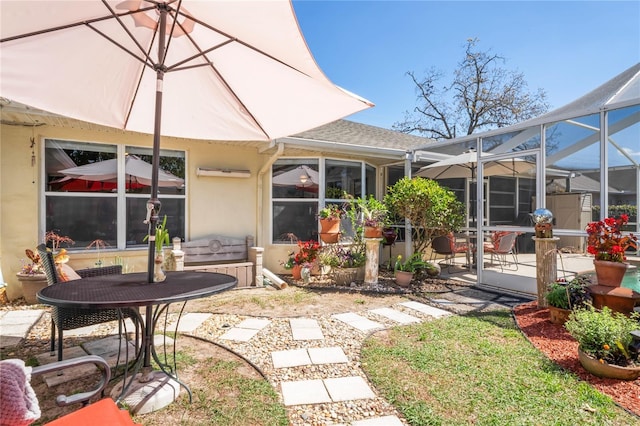 view of patio / terrace with a lanai