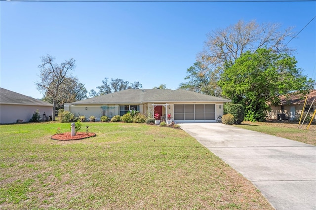 ranch-style home with a garage, concrete driveway, and a front lawn