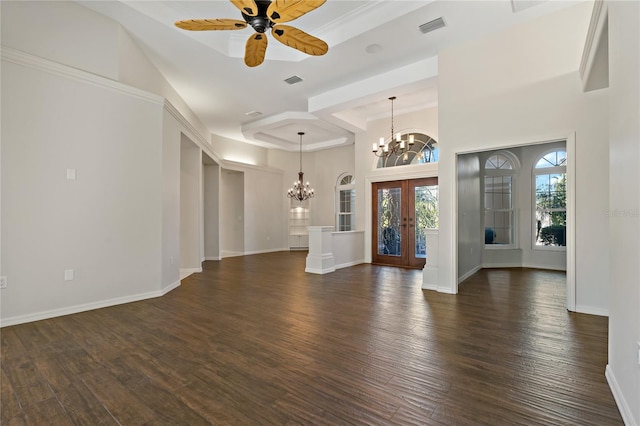 unfurnished living room with dark wood finished floors, french doors, visible vents, and baseboards