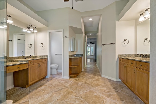 full bath with a sink, toilet, and a ceiling fan