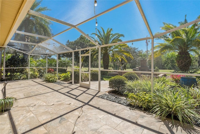 view of patio with a lanai