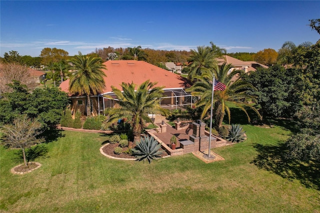 view of yard featuring a lanai