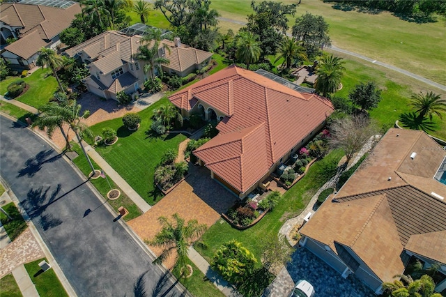 birds eye view of property with a residential view