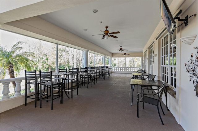 view of patio / terrace with outdoor dining space and ceiling fan