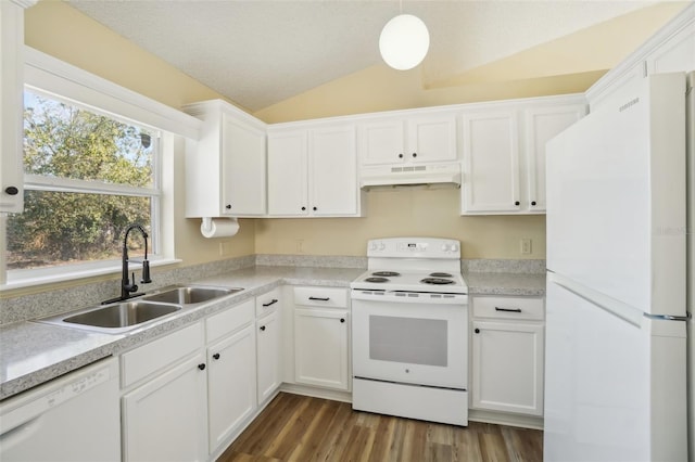 kitchen with lofted ceiling, under cabinet range hood, white appliances, a sink, and white cabinetry