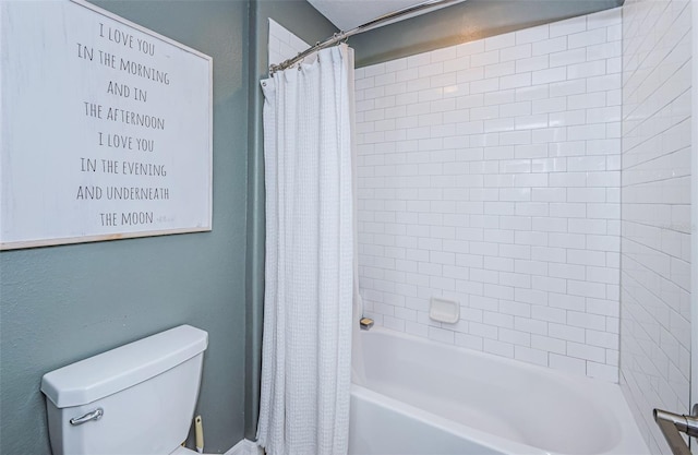 bathroom with toilet and shower / bath combo with shower curtain