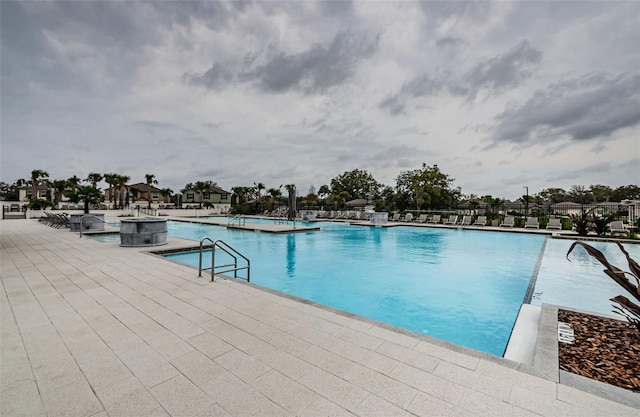 pool with a patio