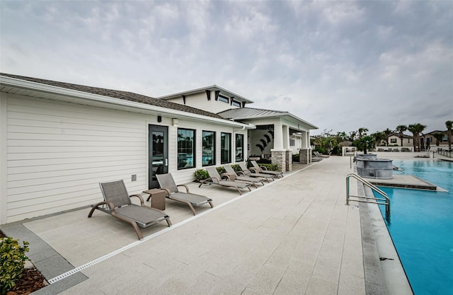 pool with a patio