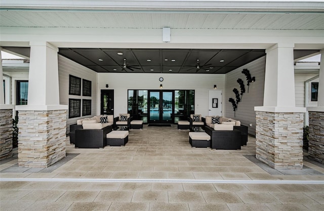 view of patio featuring an outdoor hangout area and a ceiling fan