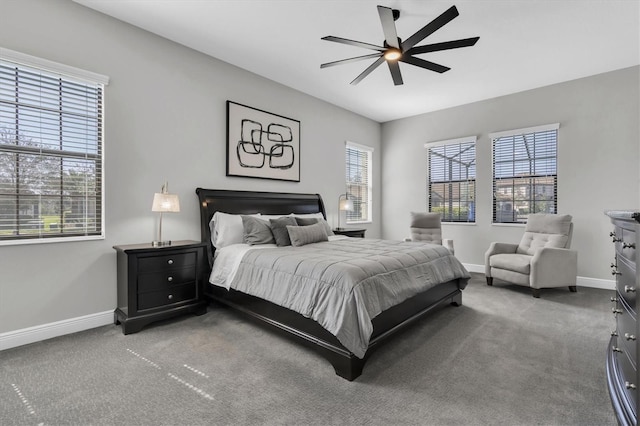 bedroom featuring carpet floors, a ceiling fan, and baseboards