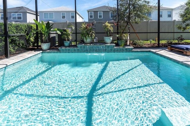 view of pool featuring a fenced in pool, a lanai, and fence