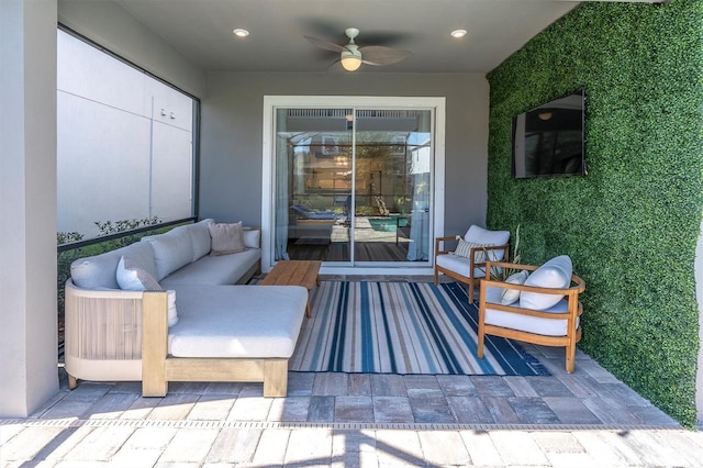 view of patio / terrace featuring ceiling fan and outdoor lounge area