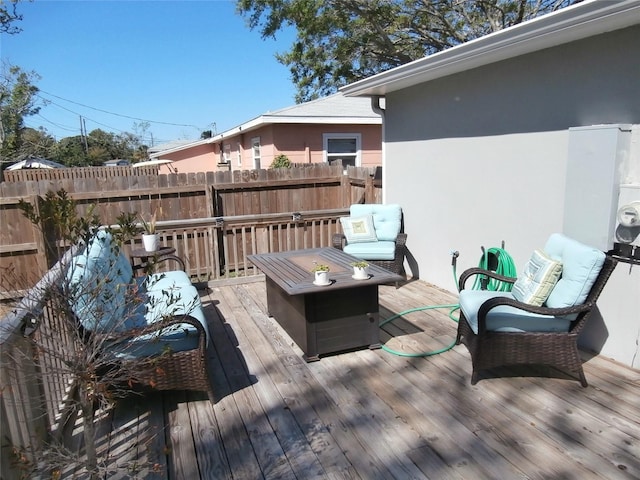 wooden deck featuring fence