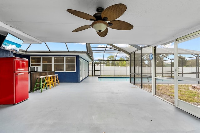 unfurnished sunroom with cooling unit