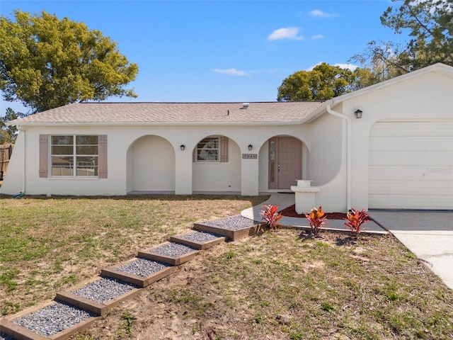 7048 Oberon Ave, Spring Hill, FL 34608 - ranch-style house featuring an attached garage, stucco siding, a front lawn, and driveway