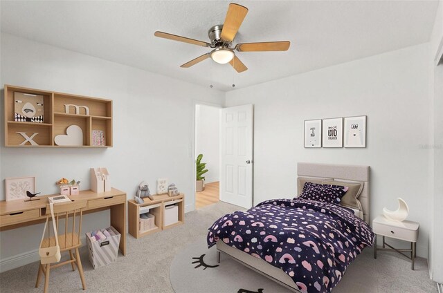 7048 Oberon Ave, Spring Hill, FL 34608 - carpeted bedroom with a ceiling fan