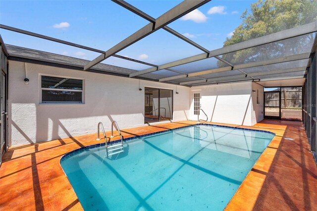 7048 Oberon Ave, Spring Hill, FL 34608 - swimming pool featuring a patio area and a lanai