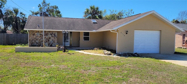 ranch-style house featuring stucco siding, driveway, fence, a front yard, and a garage