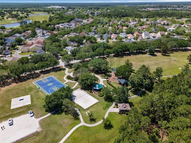 bird's eye view featuring a residential view and a water view