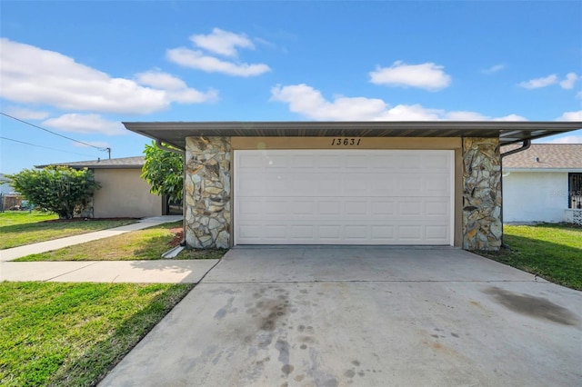 garage featuring driveway