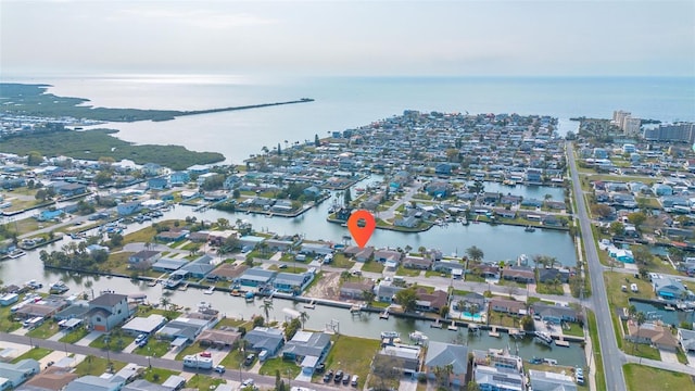 aerial view featuring a residential view and a water view