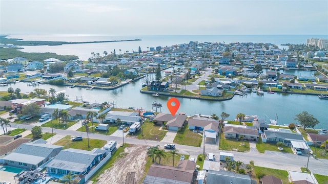 aerial view featuring a residential view and a water view