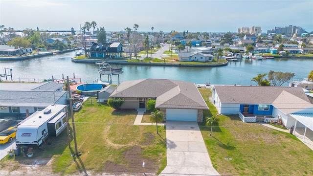 drone / aerial view with a water view