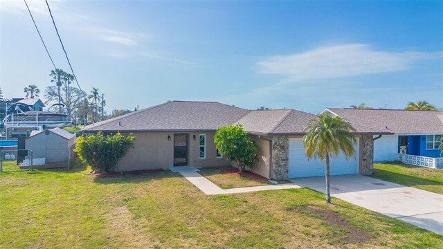 ranch-style house with driveway, stone siding, roof with shingles, a front yard, and an attached garage