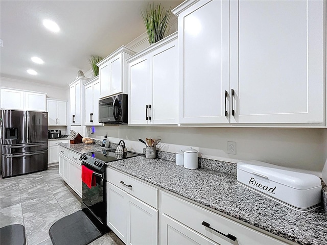 kitchen with black appliances, recessed lighting, white cabinets, and light stone countertops