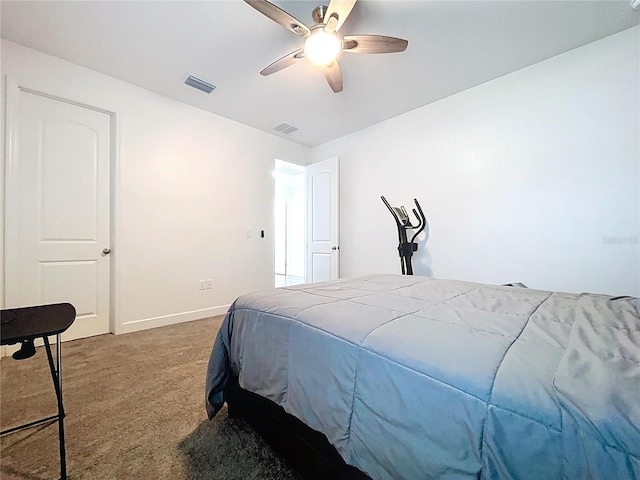 carpeted bedroom with ceiling fan, visible vents, and baseboards