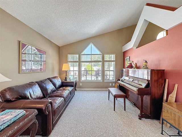 living area with vaulted ceiling, carpet, baseboards, and a textured ceiling