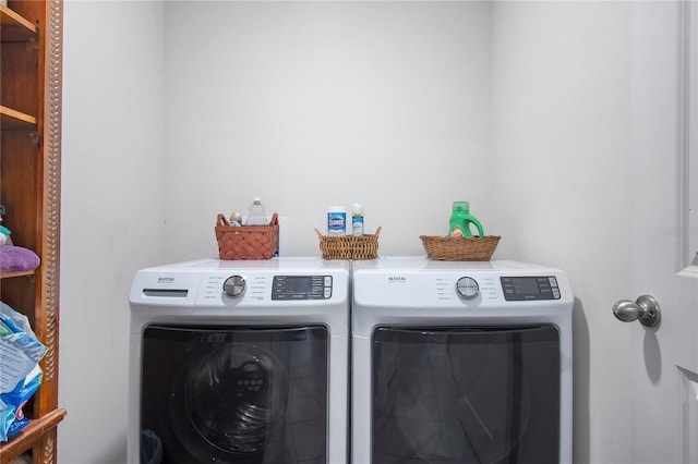 laundry area featuring laundry area and washer and clothes dryer