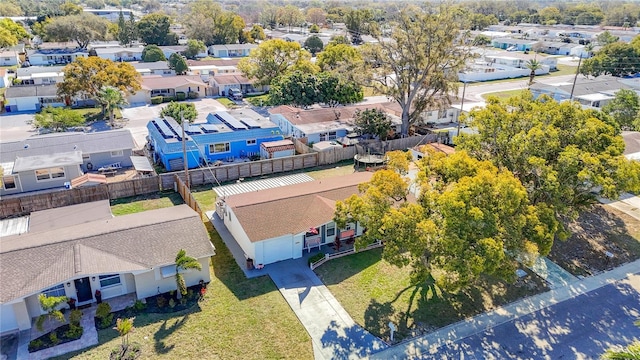 birds eye view of property with a residential view