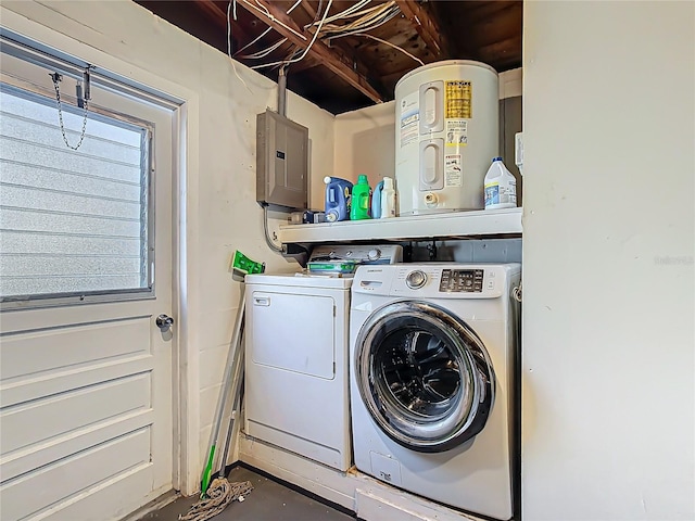 washroom with washing machine and dryer, laundry area, and electric panel