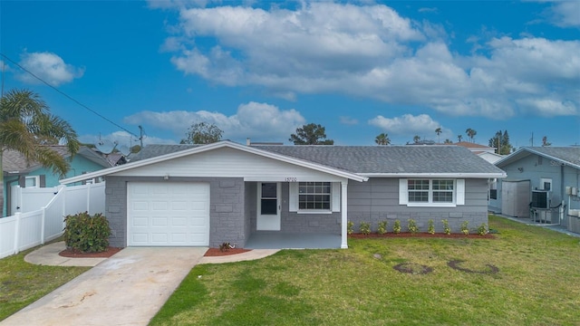 single story home with fence, roof with shingles, concrete driveway, an attached garage, and a front yard