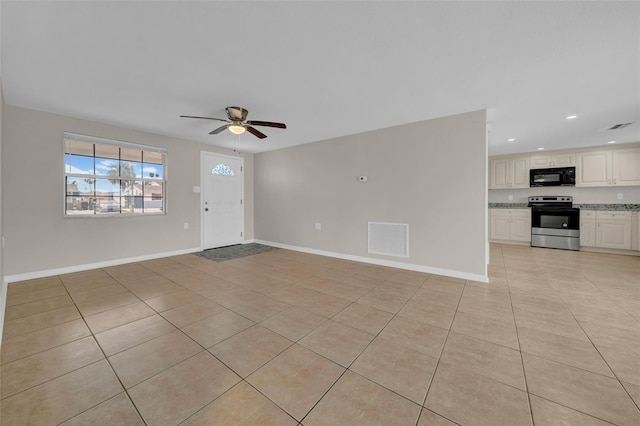 unfurnished living room with visible vents, recessed lighting, light tile patterned flooring, baseboards, and ceiling fan