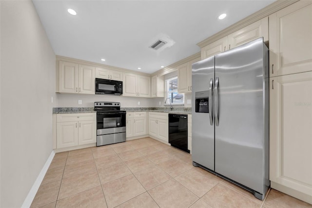 kitchen with visible vents, light stone countertops, recessed lighting, light tile patterned flooring, and black appliances