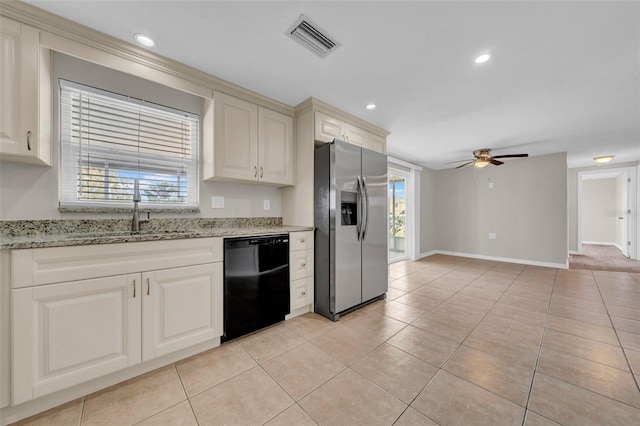 kitchen featuring visible vents, a ceiling fan, stainless steel refrigerator with ice dispenser, a sink, and dishwasher