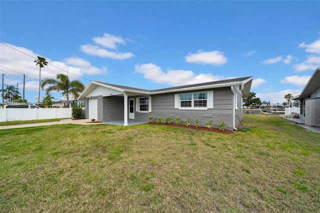 single story home featuring a patio, fence, an attached garage, a front lawn, and concrete driveway