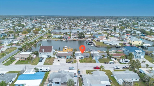 aerial view featuring a residential view and a water view