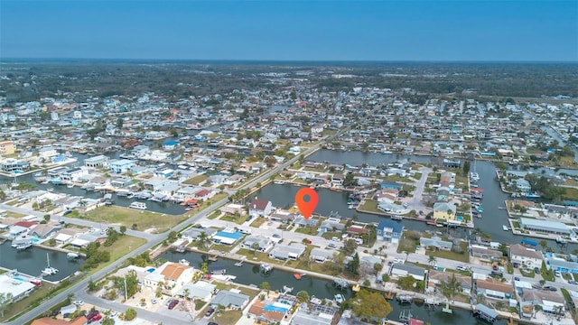 bird's eye view featuring a residential view and a water view