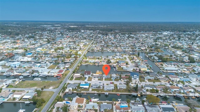 aerial view with a residential view and a water view