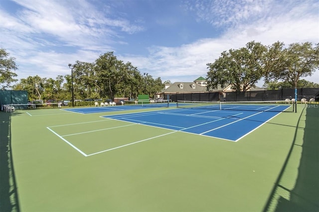 view of sport court with community basketball court and fence