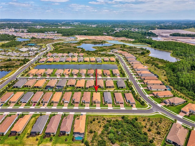 aerial view with a water view and a residential view