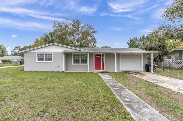 ranch-style home featuring fence, driveway, an attached garage, stucco siding, and a front lawn