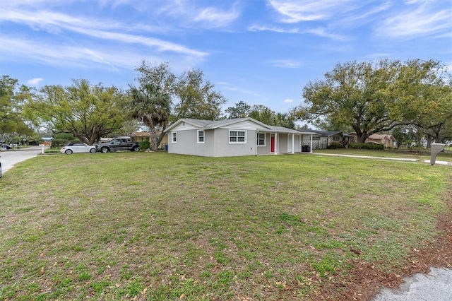 view of front of property with a front lawn