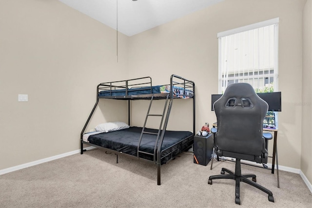 bedroom with baseboards and carpet floors