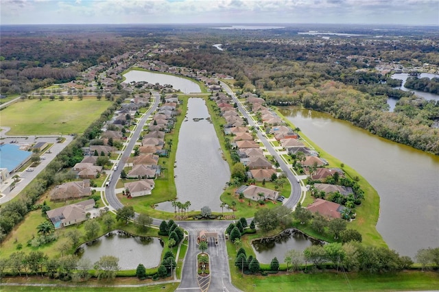 aerial view featuring a residential view and a water view